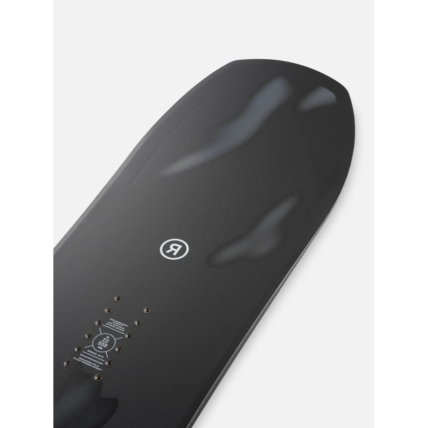Snowboard, schwarzes Deck, Bindungseinsätze, Carbonfaseroptik