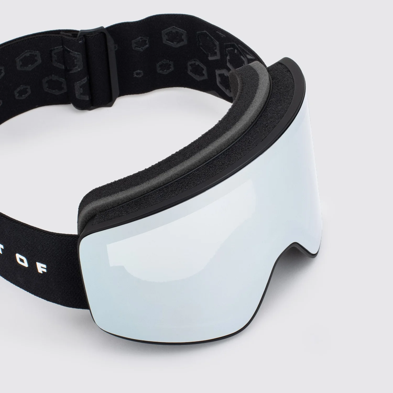 Skibrille, verspiegelte Scheibe, schwarzes Band, Schaumstoffpolsterung, geometrisches Muster