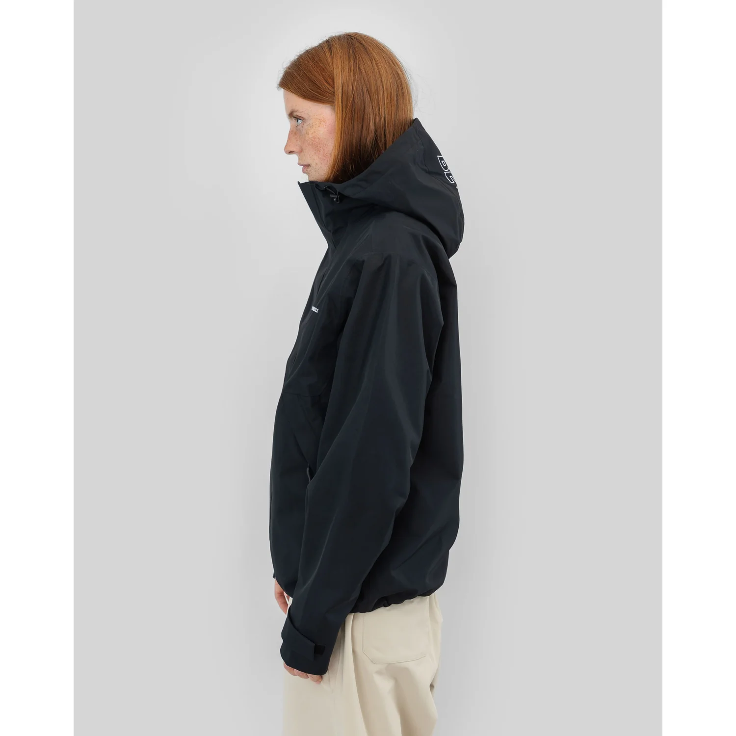 The Jacket Veste noire, capuche, veste de plein air, fermeture éclair, manches longues