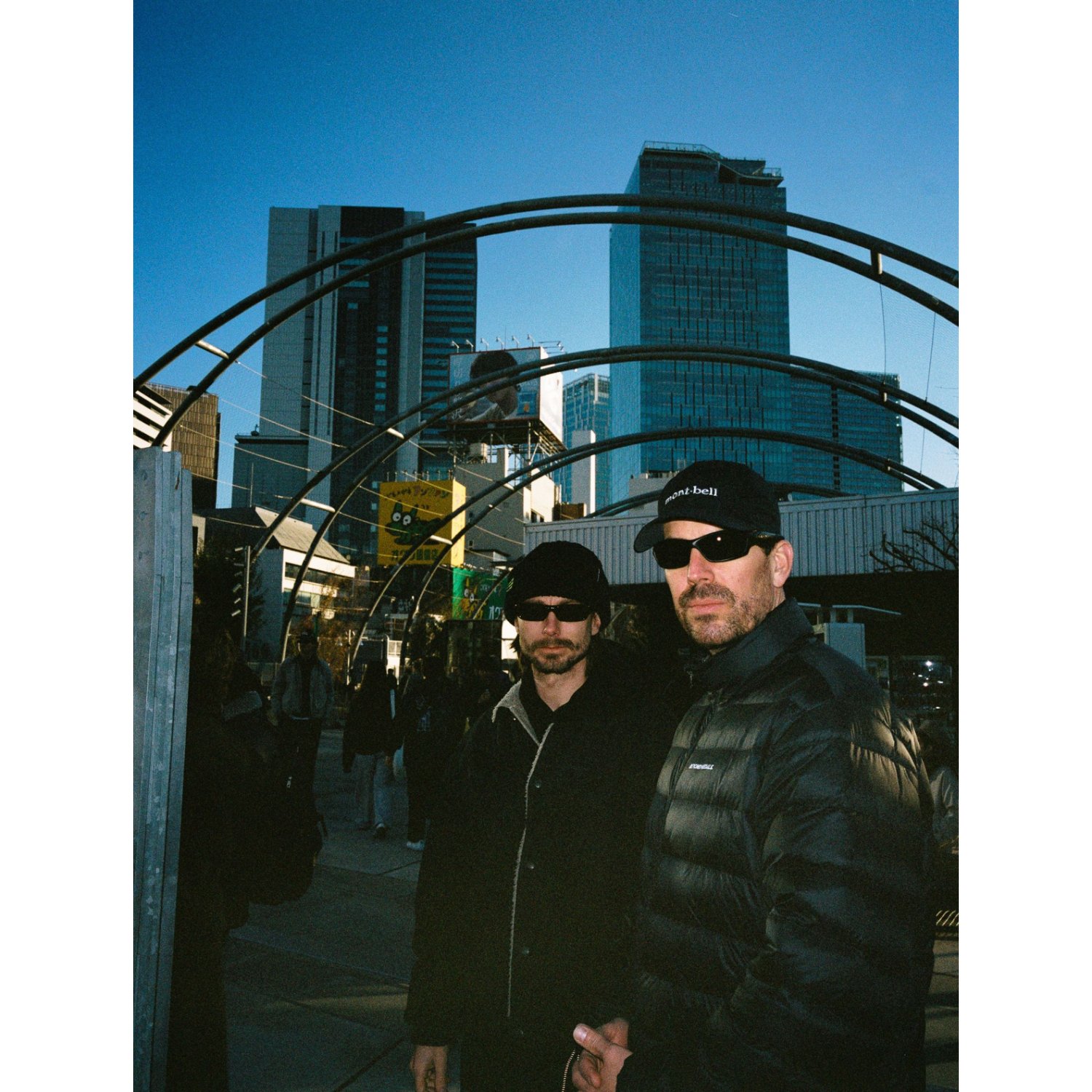 Packable Down Jacket jackets, sunglasses, baseball cap, urban, cityscape
