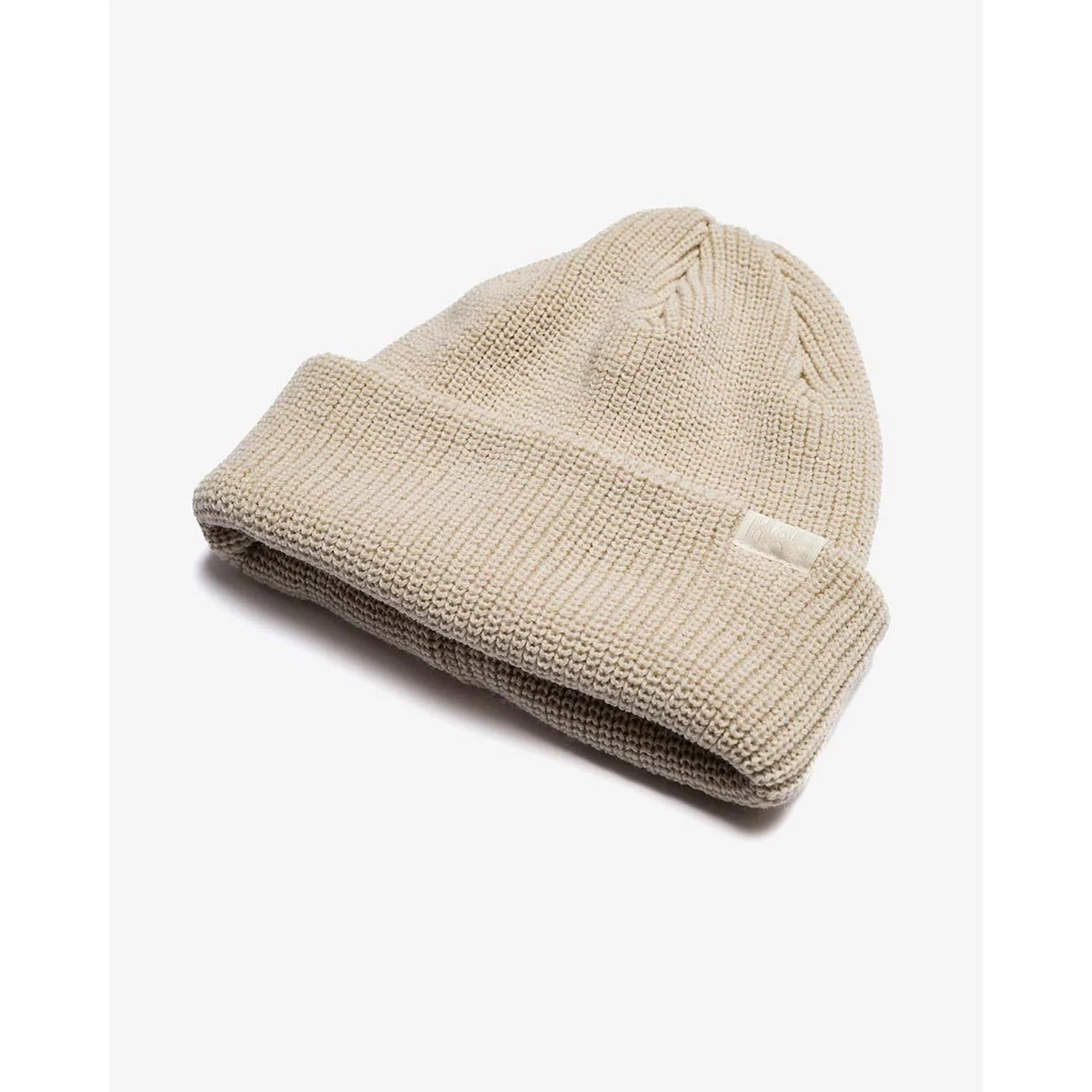 Bonnet en tricot, beige, bord rabattu, motif tricoté