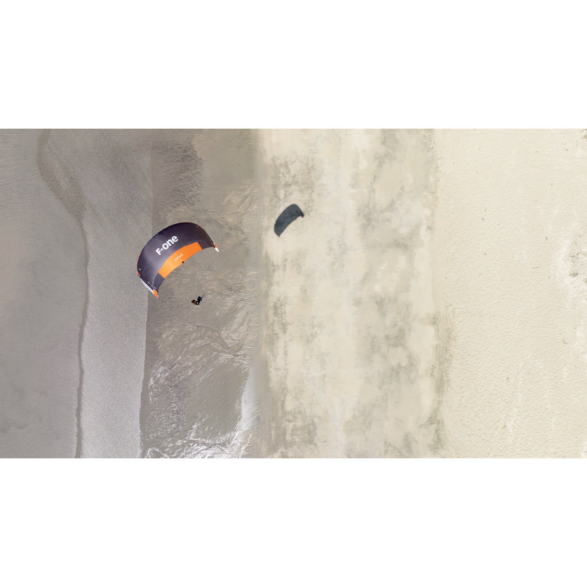 Bandit TEC paragliding, paraglider, orange stripe, sand beach, aerial view
