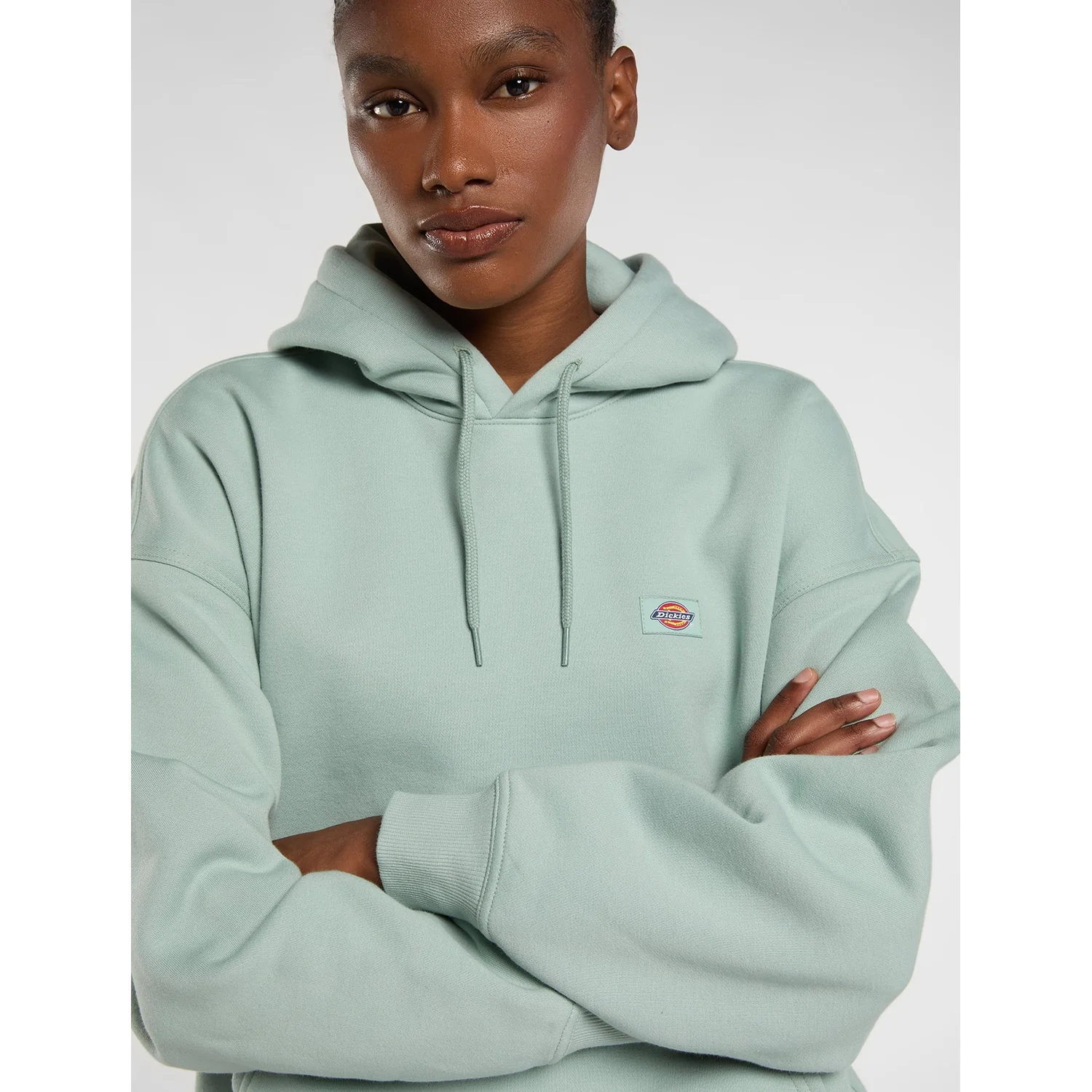 Oakport Hoodie W Sweat à capuche unisexe vert menthe/pastel, couleur unie, pull avec poche kangourou, cordon de serrage, étiquette logo et logo brodé.