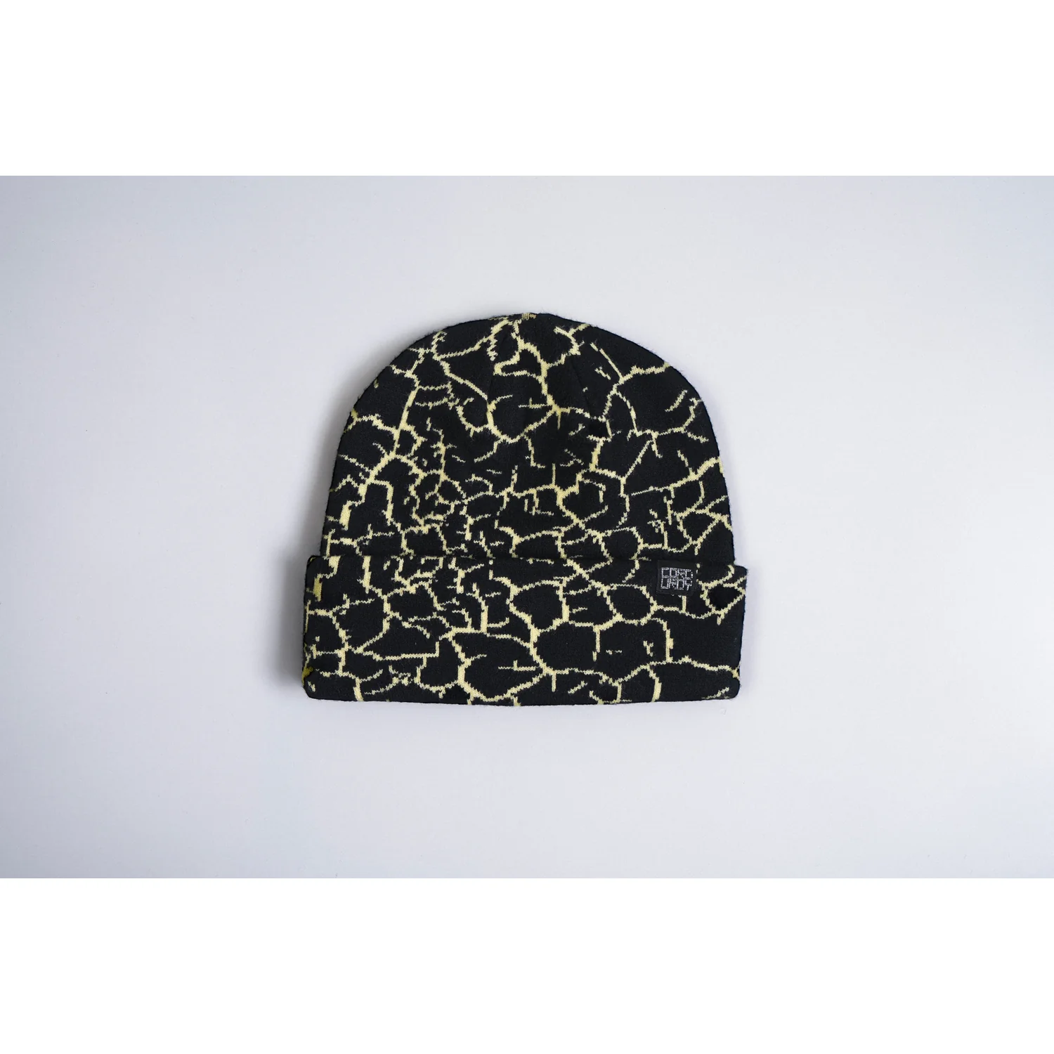 Rumble Beanie Strickmütze, Schwarz, Gelbes Muster, Umschlagrand, Geometrisches Muster