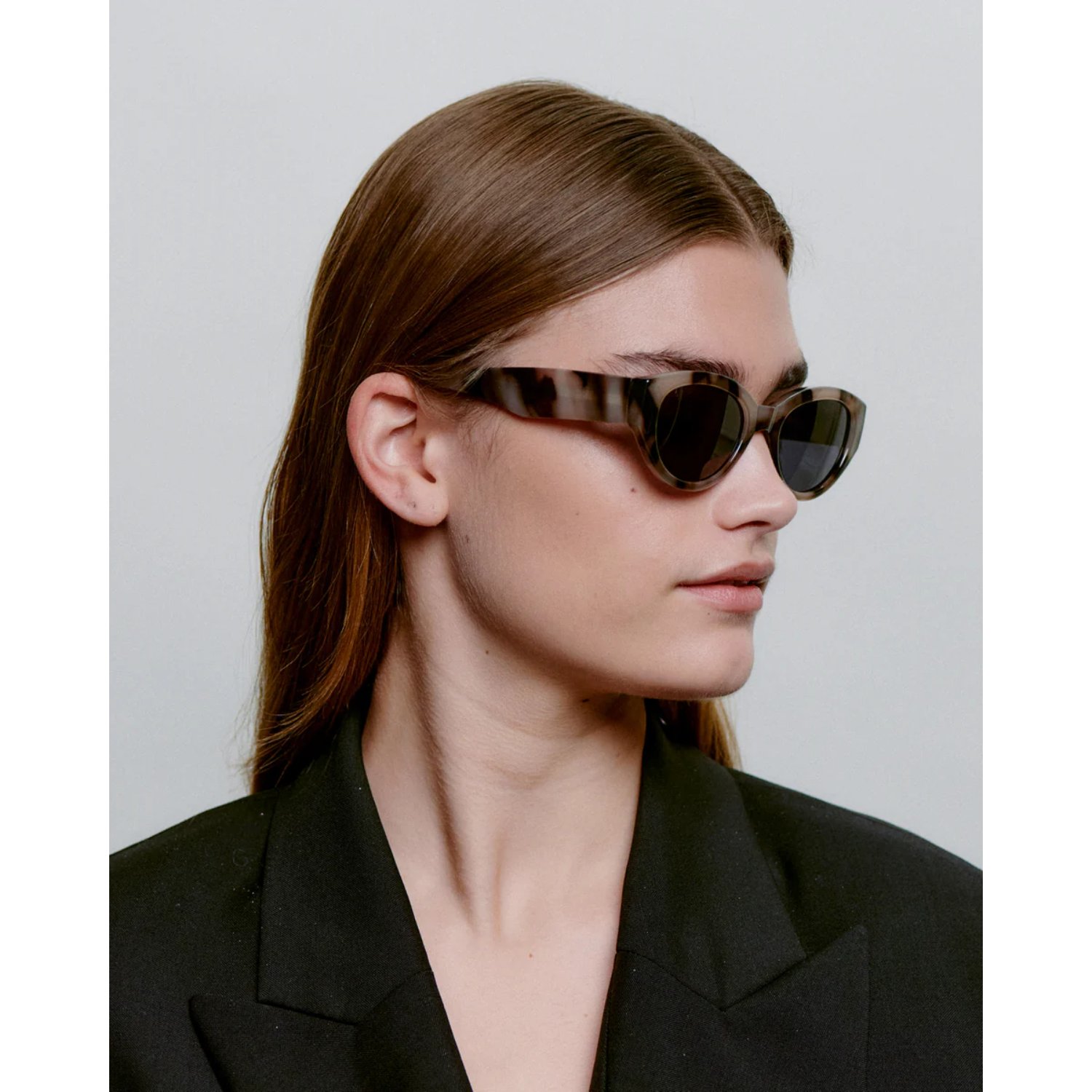 Lunettes de soleil, femme, noires, motif œil-de-tigre, forme « œil de chat »