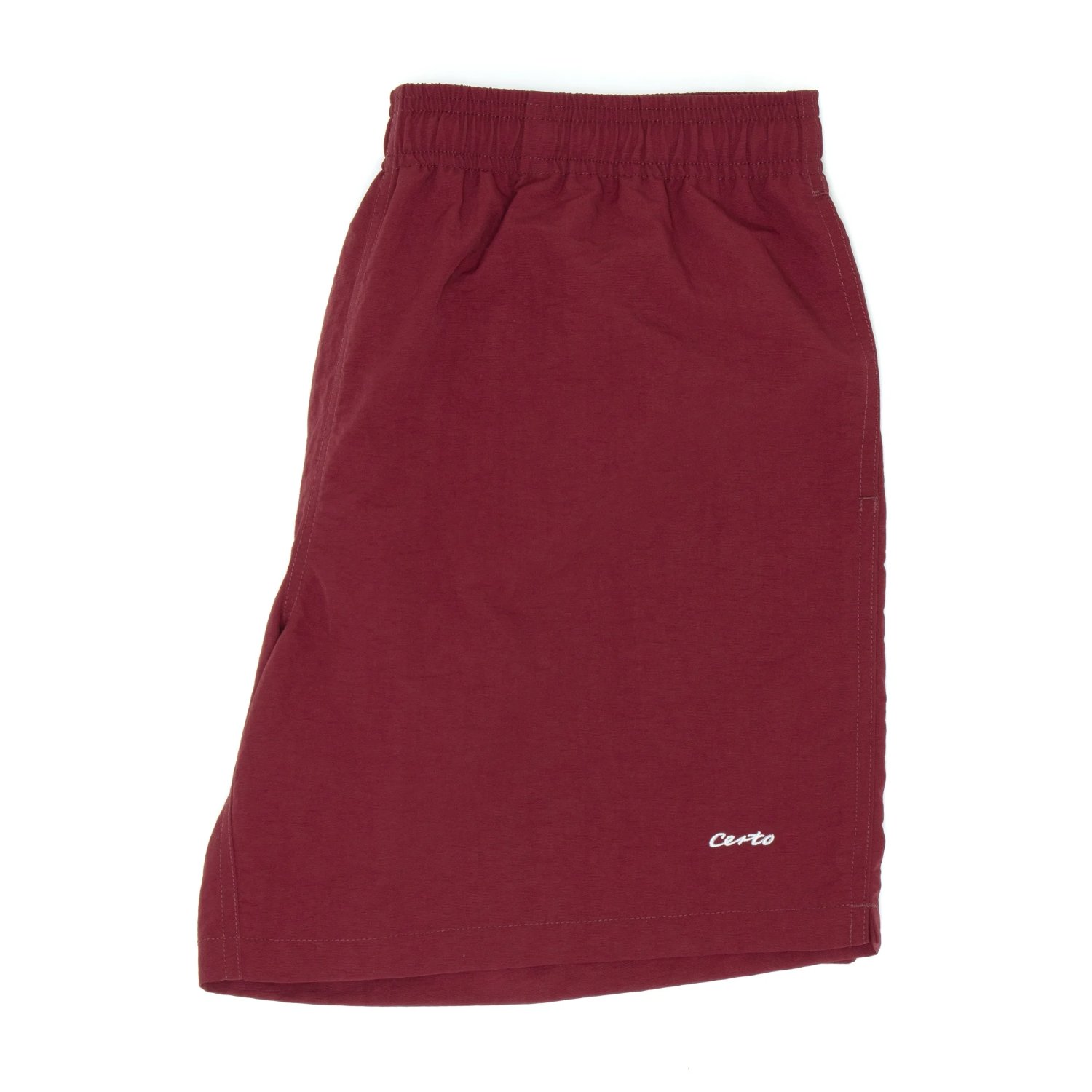 Pantalon, couleur rouge, taille élastiquée, longueur genou, logo de la marque Cento
