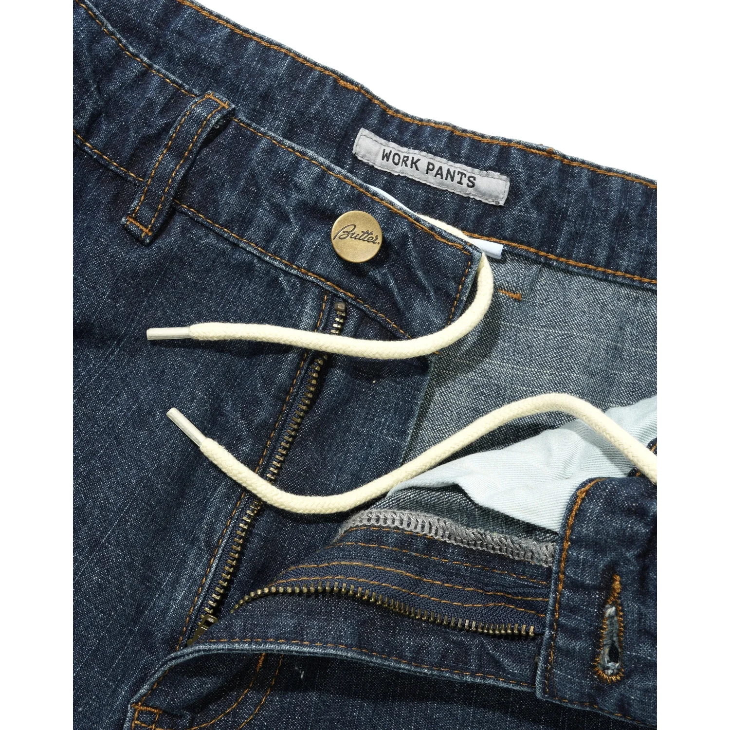 Pantalon en jean, denim foncé, cordon de serrage, fermeture éclair, coutures contrastées