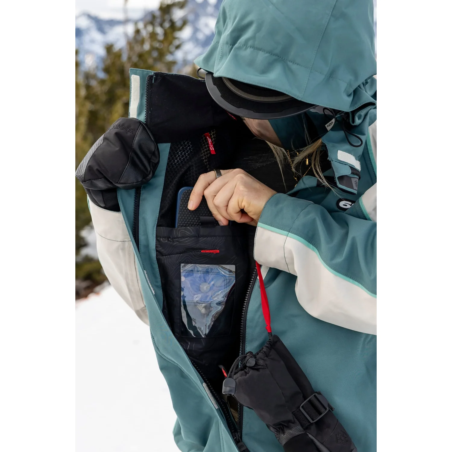 Hologram Jacket Veste de ski, turquoise et blanche, poche poitrine, poche pour forfait de ski, matière imperméable
